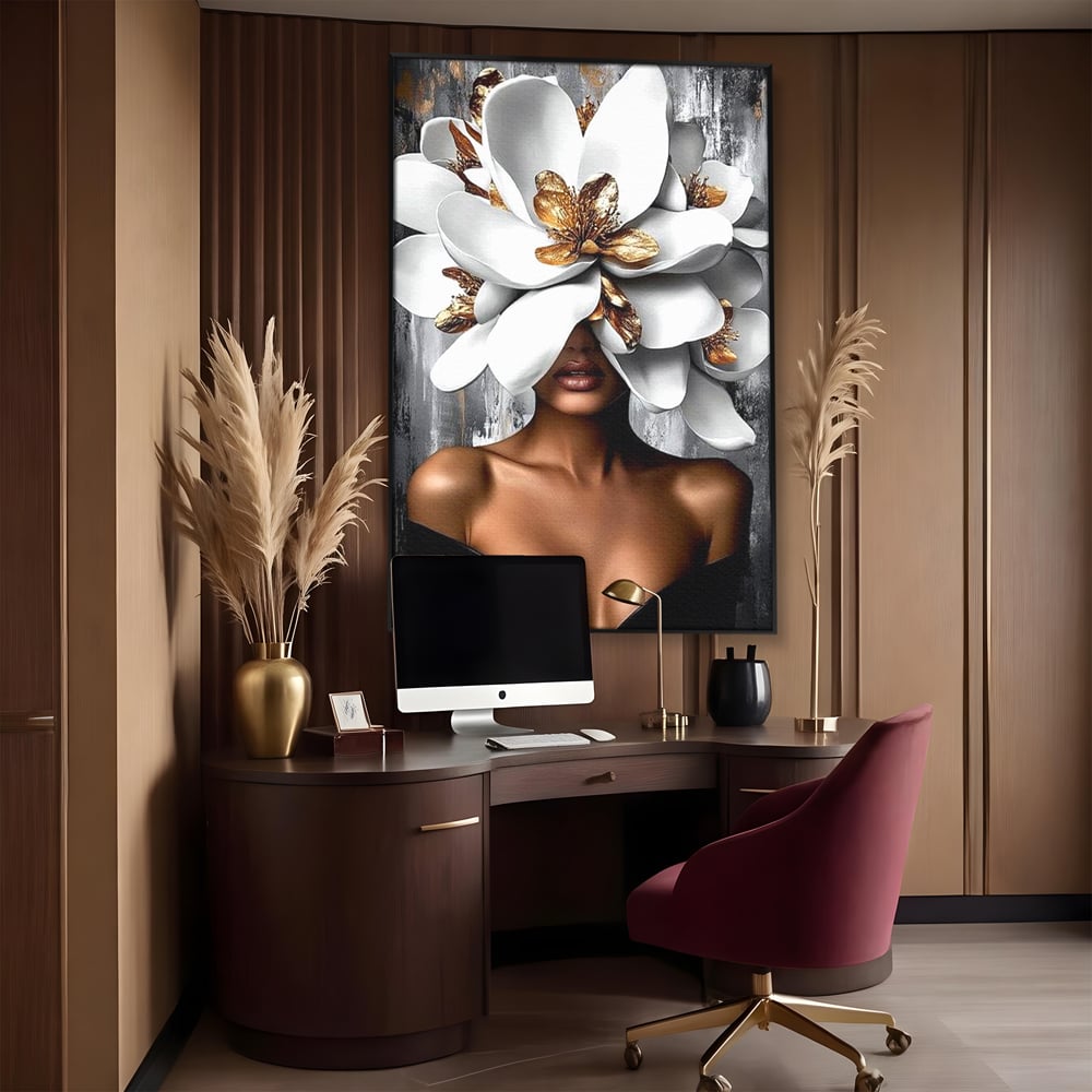 Tablou canvas cu tablou canvas cu femeie si magnolie alba, in rama de aluminiu negru, pe perete intr-un birou